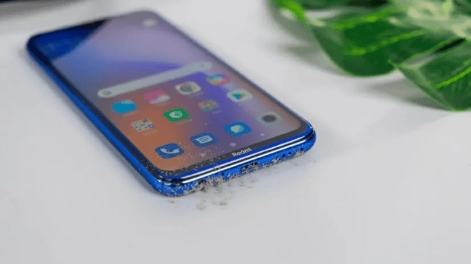 Loa điện thoại Xiaomi bị bụi